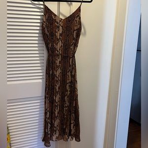 Pleated brown snakeskin midi dress. Size medium. From a boutique called Fabrik.